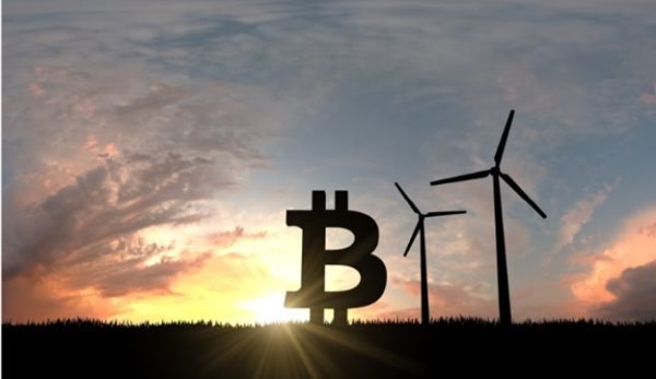 تصویر بیت کوین در کنار توربین های برقی